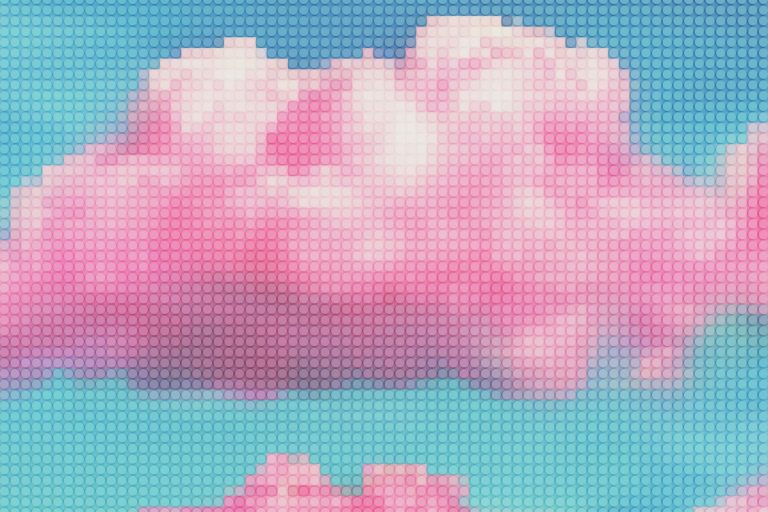 Pixelated pink clouds against a blue sky